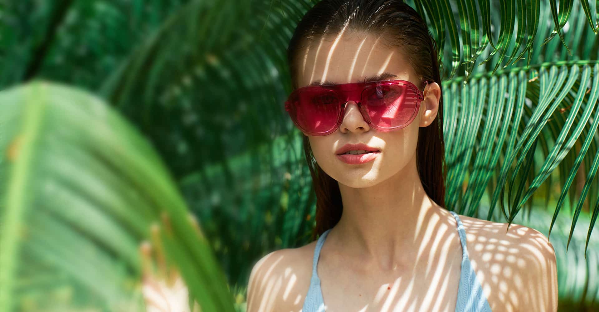 beautiful young girl wearing red sunglasses - Rejuvalife Vitality Institute - Beverly Hills